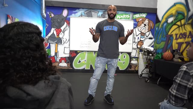 Jas Leverette teaching a training seminar